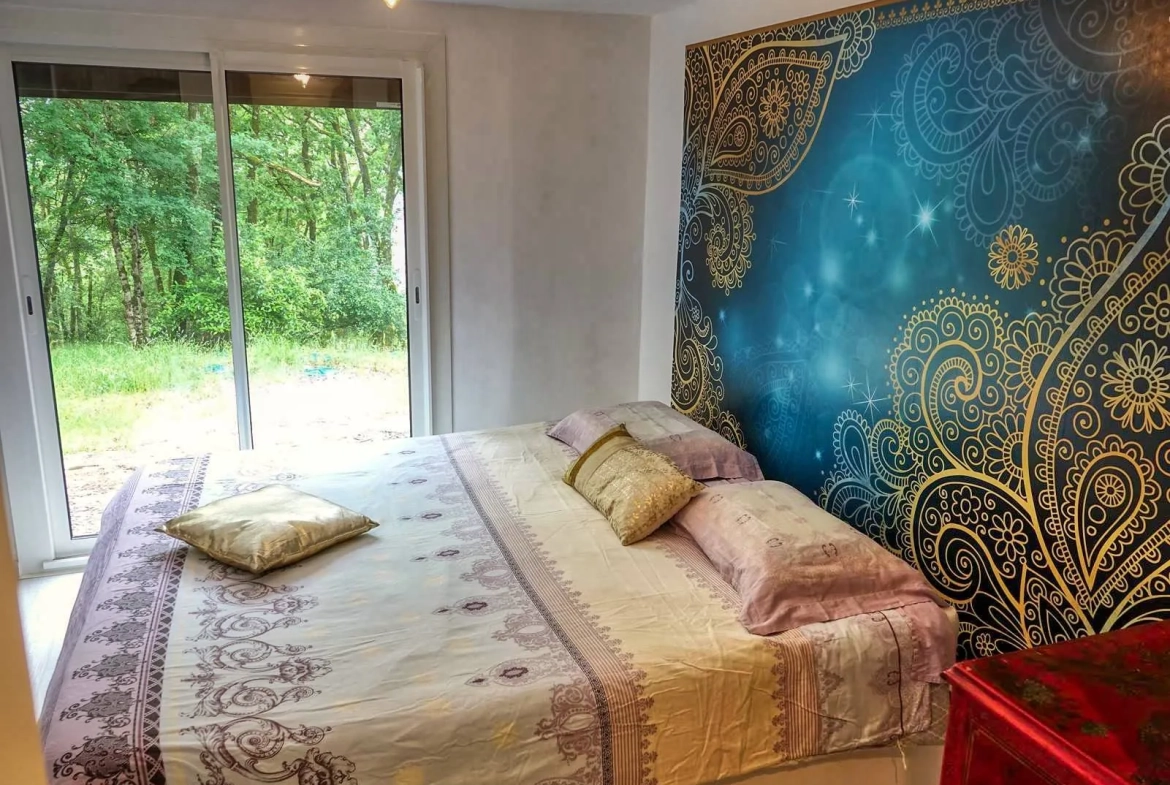 Maison contemporaine écologique avec vue sur la vallée du Lot, située dans un parc de 5000 m² à Castelfranc 