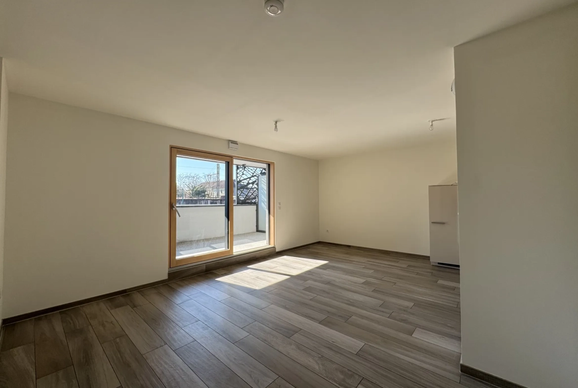 Appartement T3 récent avec terrasse et parking à Saint-Louis 