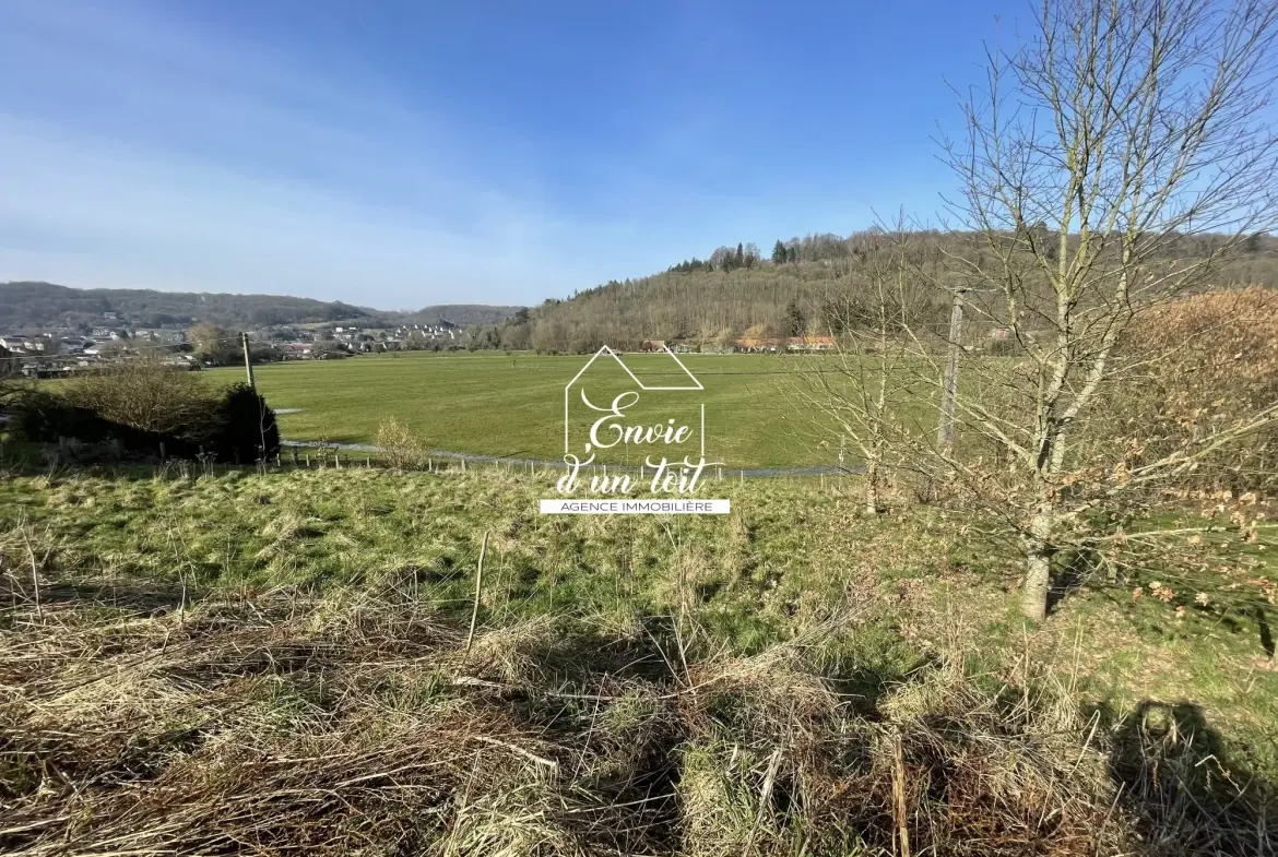 Terrain de 1669 m² à Montville avec vue dégagée et viabilisation prête à construire 