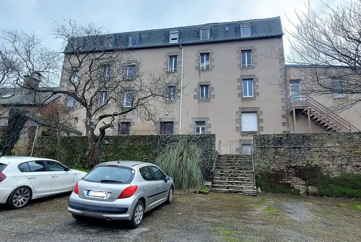 Façade arrière + parking Appartement cosy de 25 m² proche plage à Saint Michel en Grève 