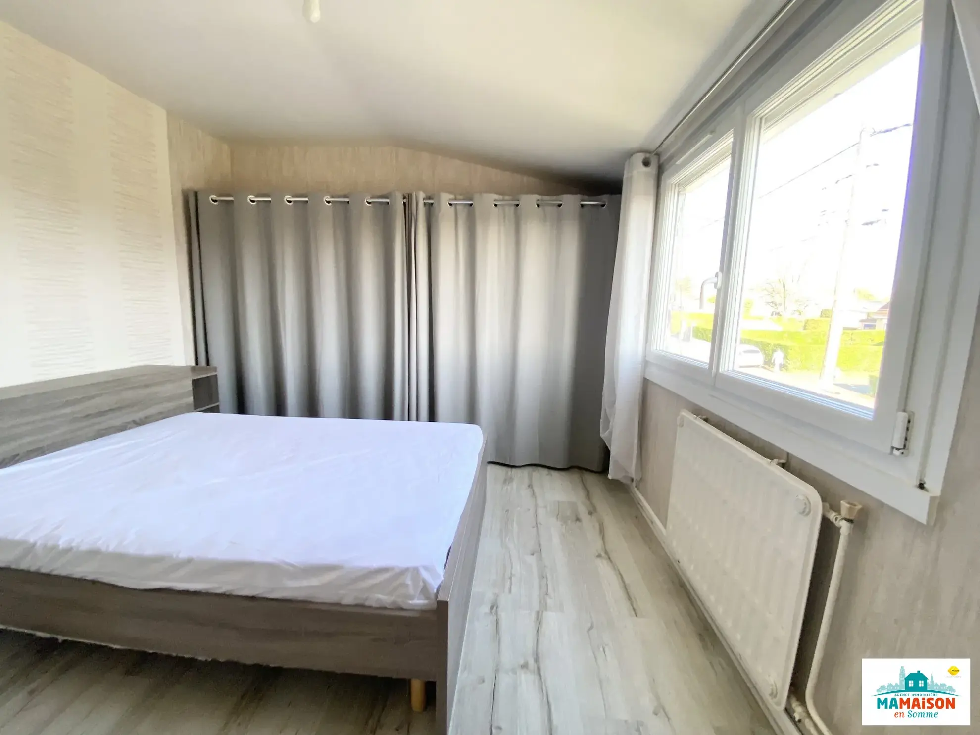 Maison semi-jumelée de 95 m² avec 4 chambres, garage et terrasse à Moreuil 