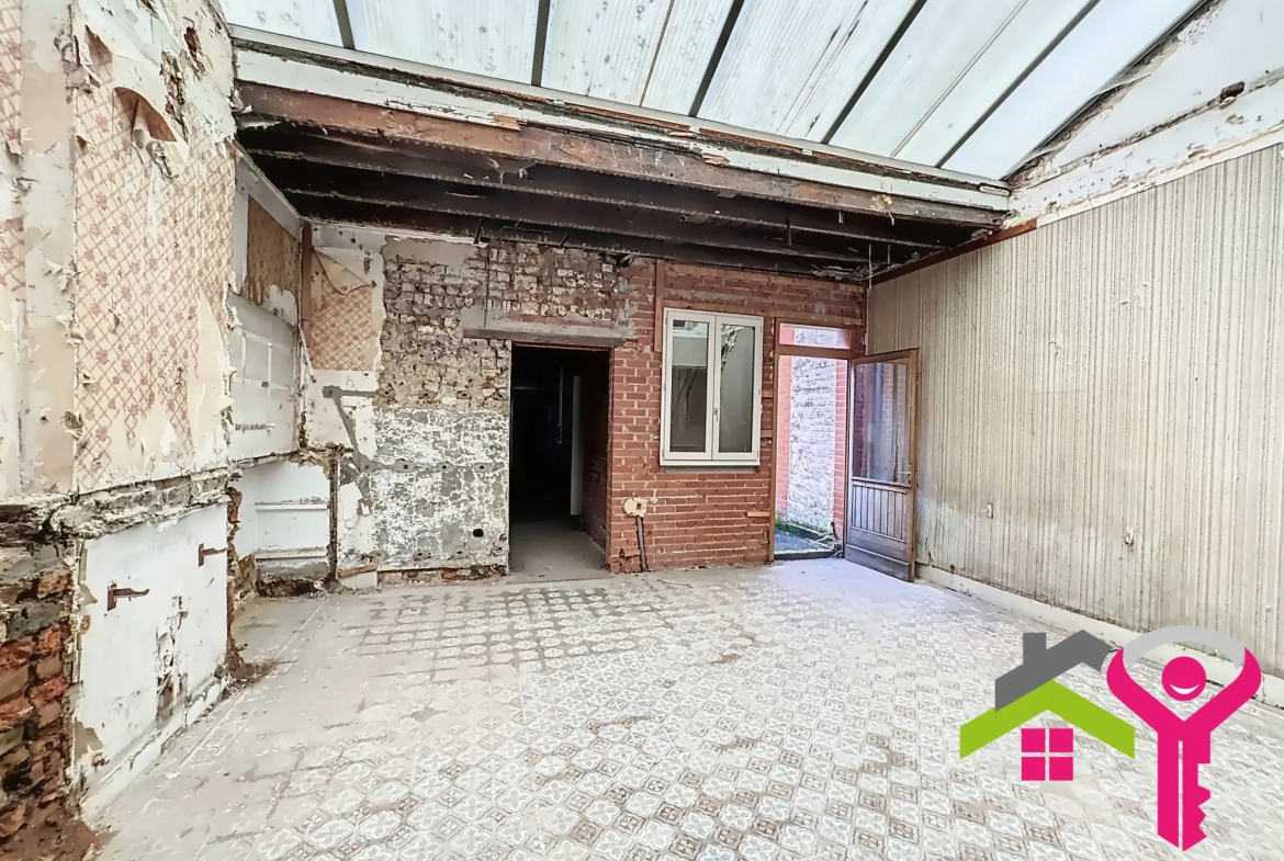Maison à vendre à Anzin avec fort potentiel et grand espace de vie 