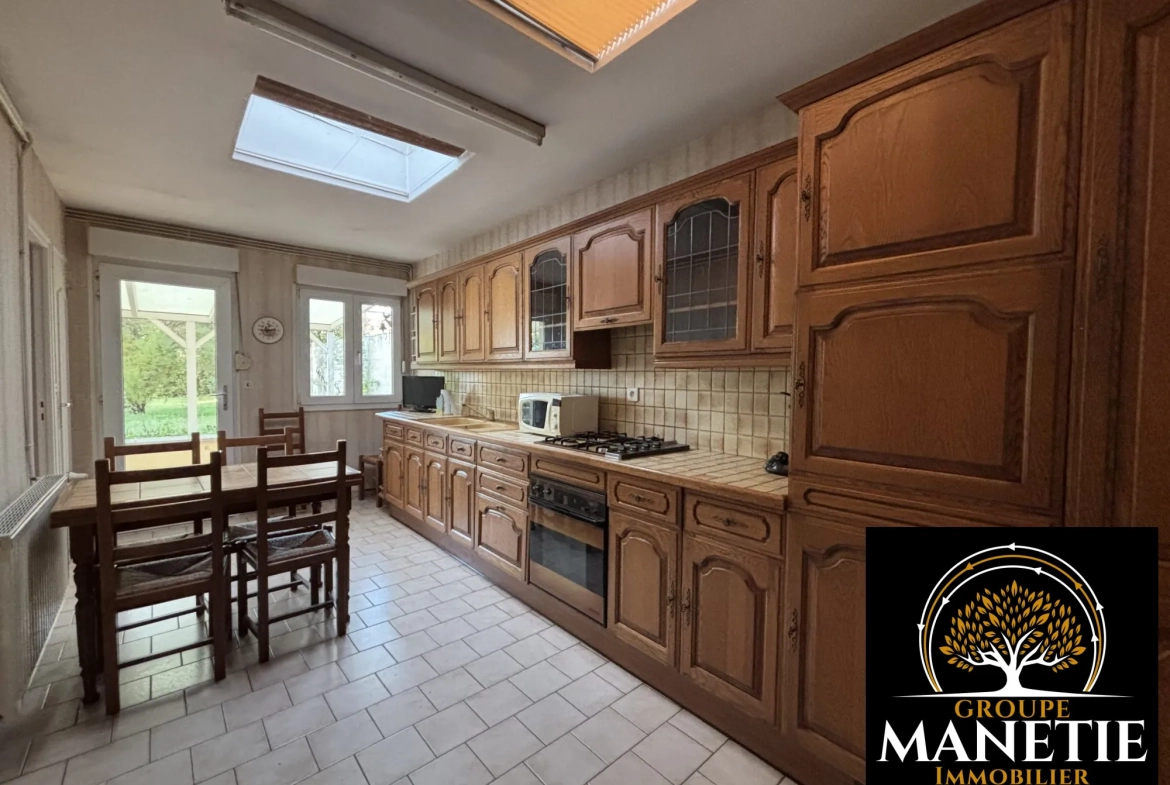 Maison de ville à rénover de 87 m² avec terrasse et jardin à Achicourt 