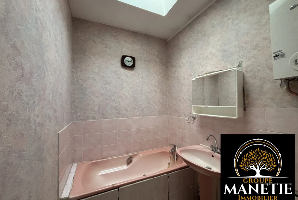 Maison de ville à rénover de 87 m² avec terrasse et jardin à Achicourt 