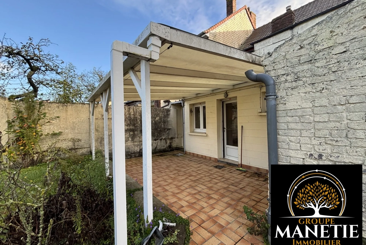 Maison de ville à rénover de 87 m² avec terrasse et jardin à Achicourt 
