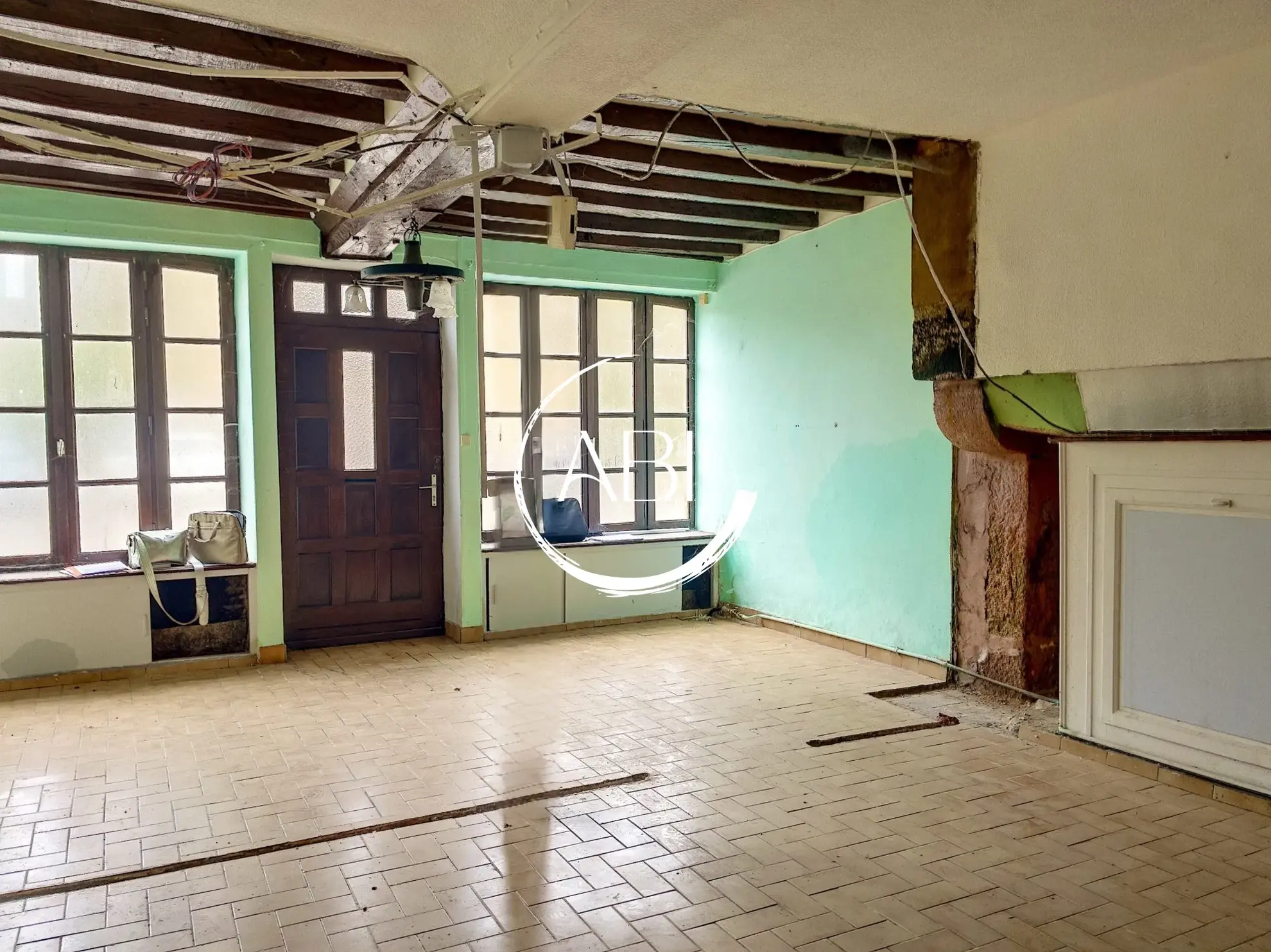 Maison de ville à rénover avec jardin à Lignières-Orgères 