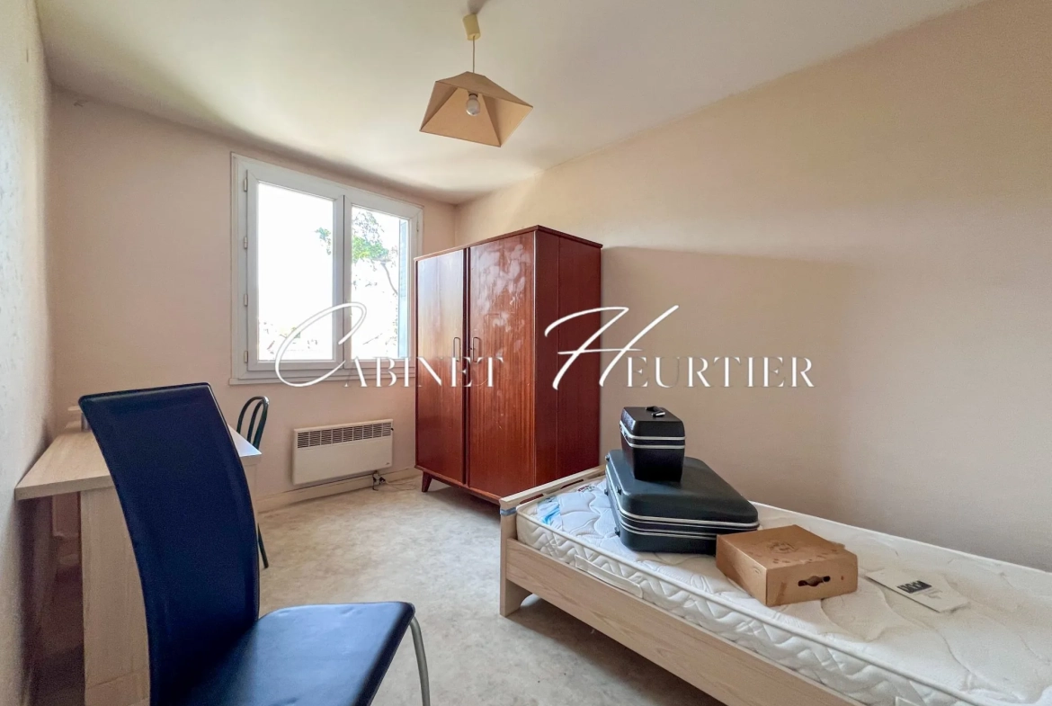 Appartement 4 pièces à vendre à Grenoble avec potentiel de rénovation 