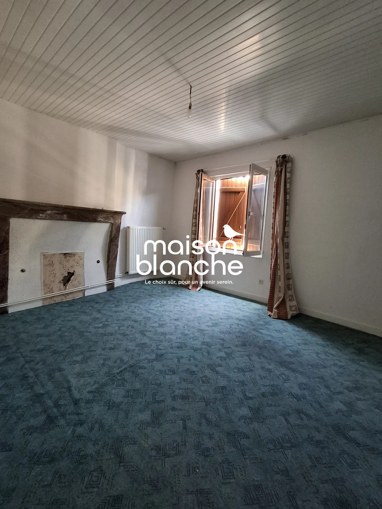 Maison à vendre à Parthenay, 100 m² avec jardin et potentiel de rénovation 
