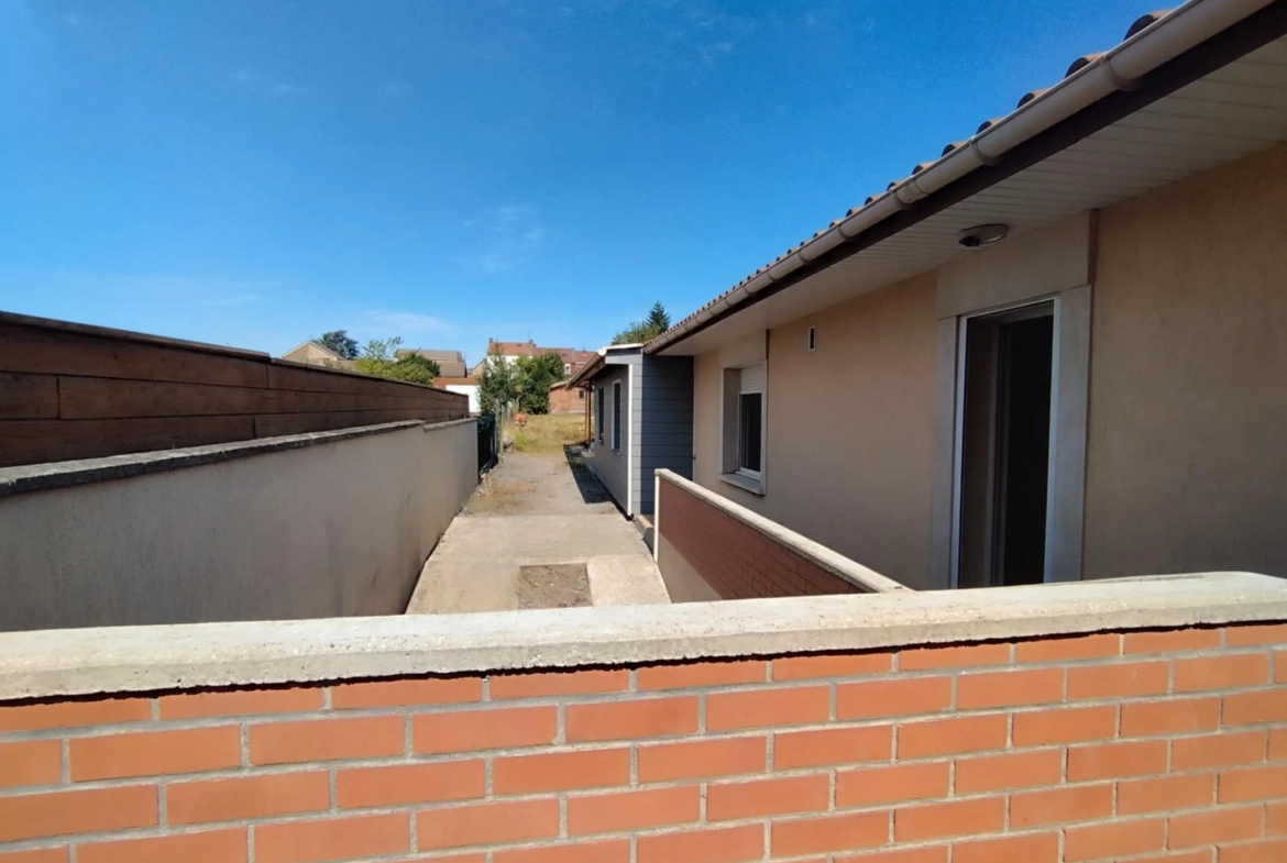 Maison plain-pied avec 3 chambres à Harnes - Confort et espace extérieur 
