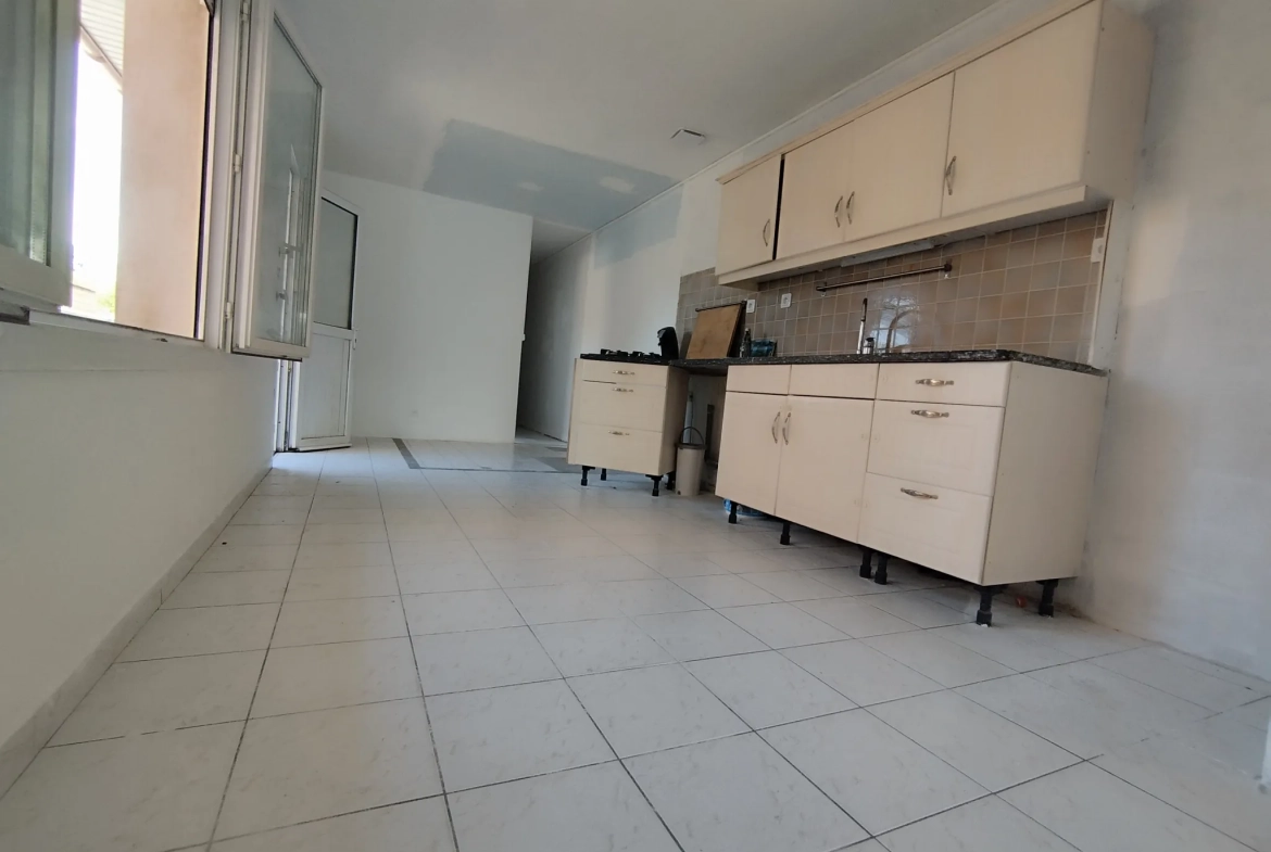 Maison plain-pied avec 3 chambres à Harnes - Confort et espace extérieur 