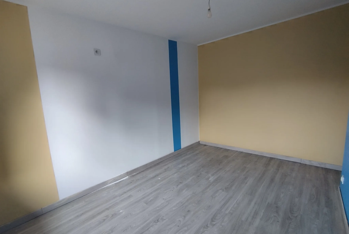 Maison plain-pied avec 3 chambres à Harnes - Confort et espace extérieur 