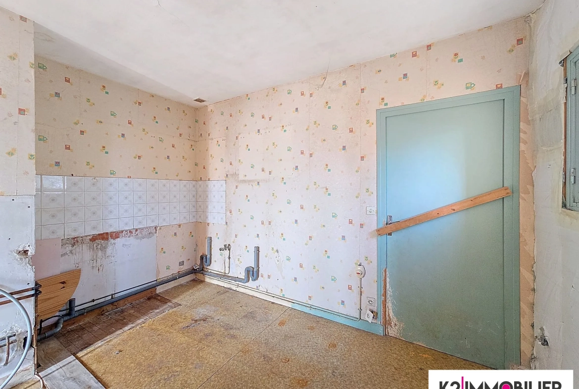 Appartement T3/4 à vendre à Privas avec jardin de 500 m² et fort potentiel 