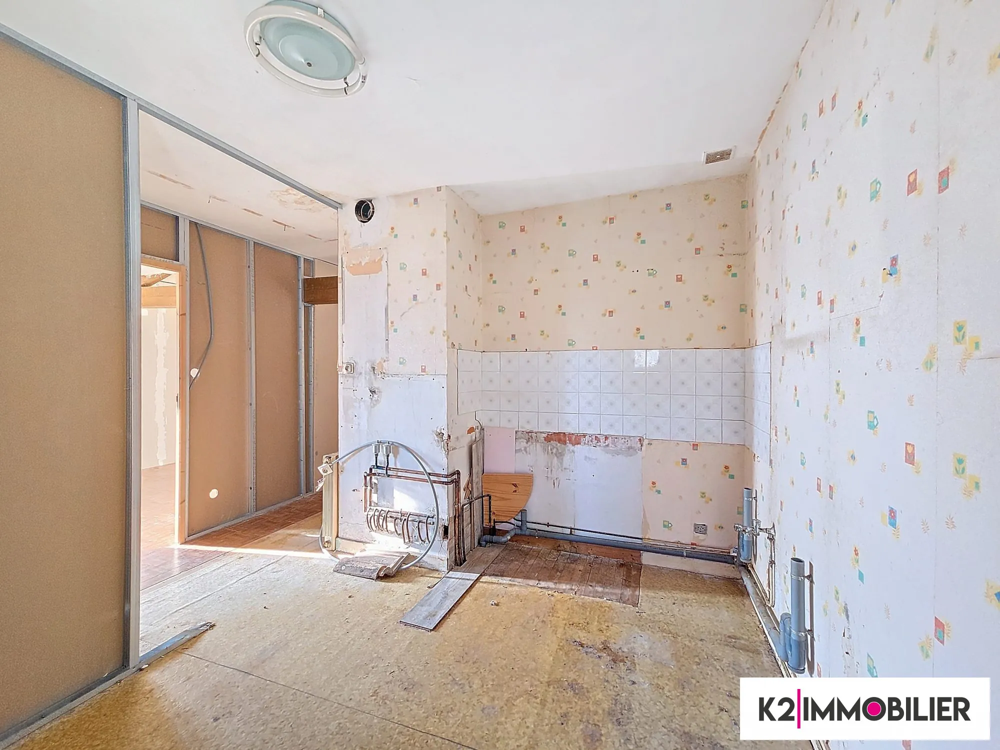 Appartement T3/4 à vendre à Privas avec jardin de 500 m² et fort potentiel 
