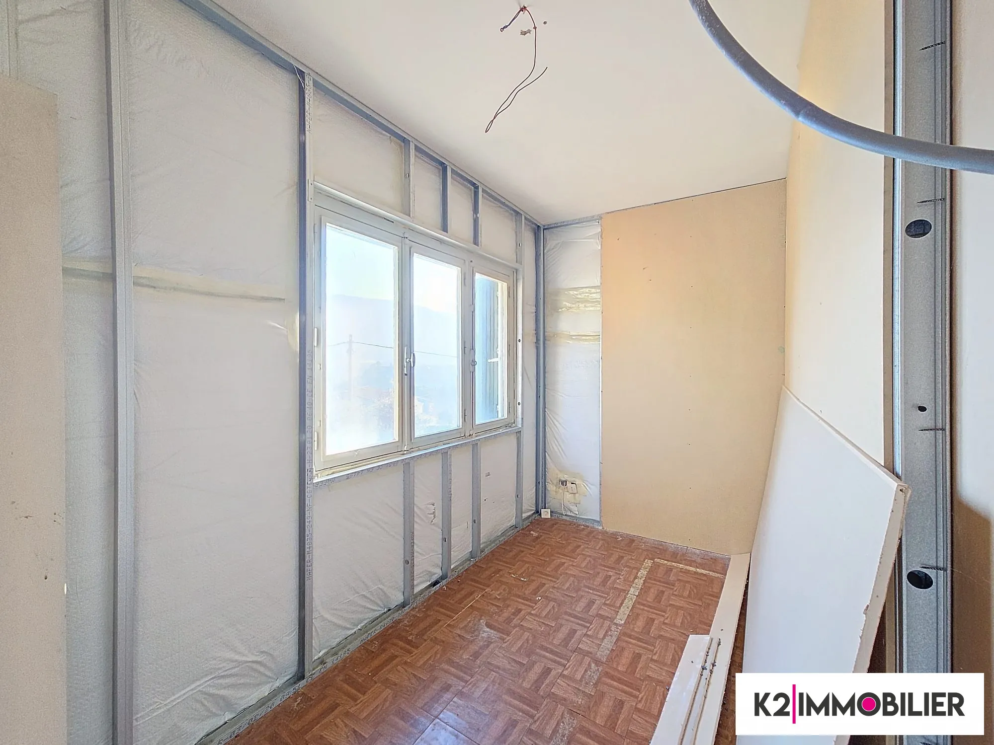 Appartement T3/4 à vendre à Privas avec jardin de 500 m² et fort potentiel 