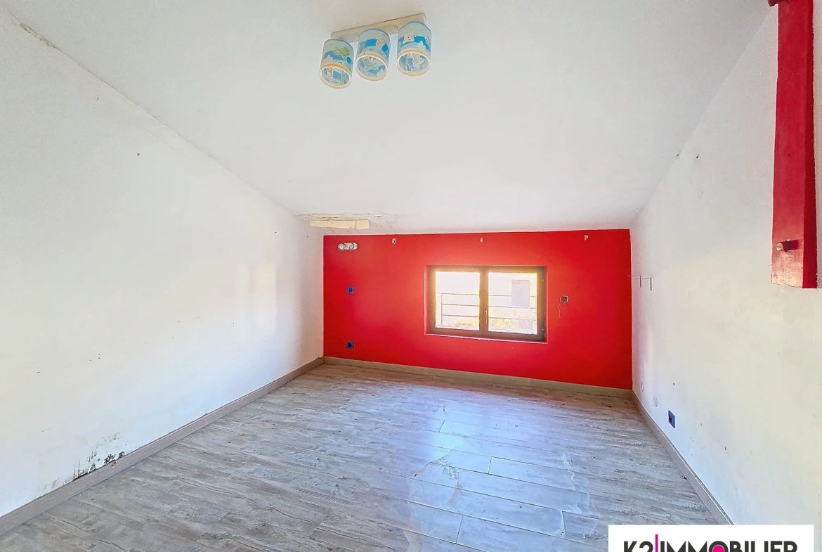 Appartement T3/4 à vendre à Privas avec jardin de 500 m² et fort potentiel 