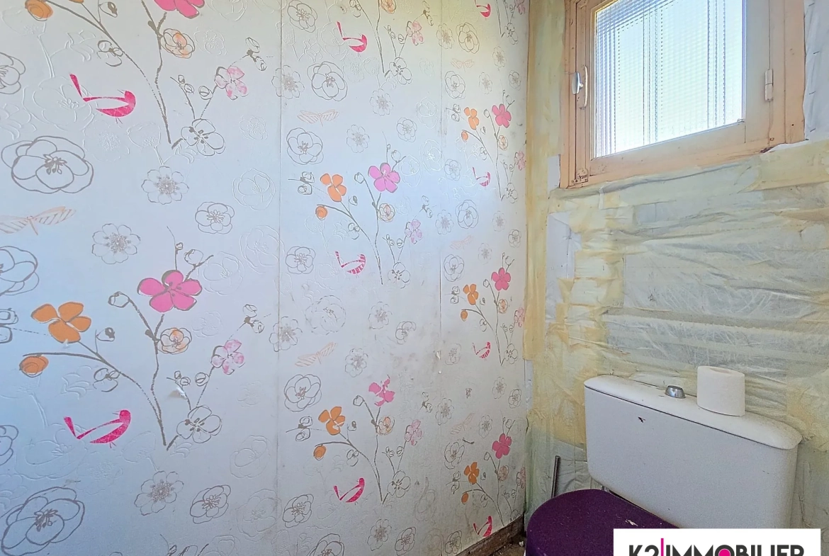 Appartement T3/4 à vendre à Privas avec jardin de 500 m² et fort potentiel 