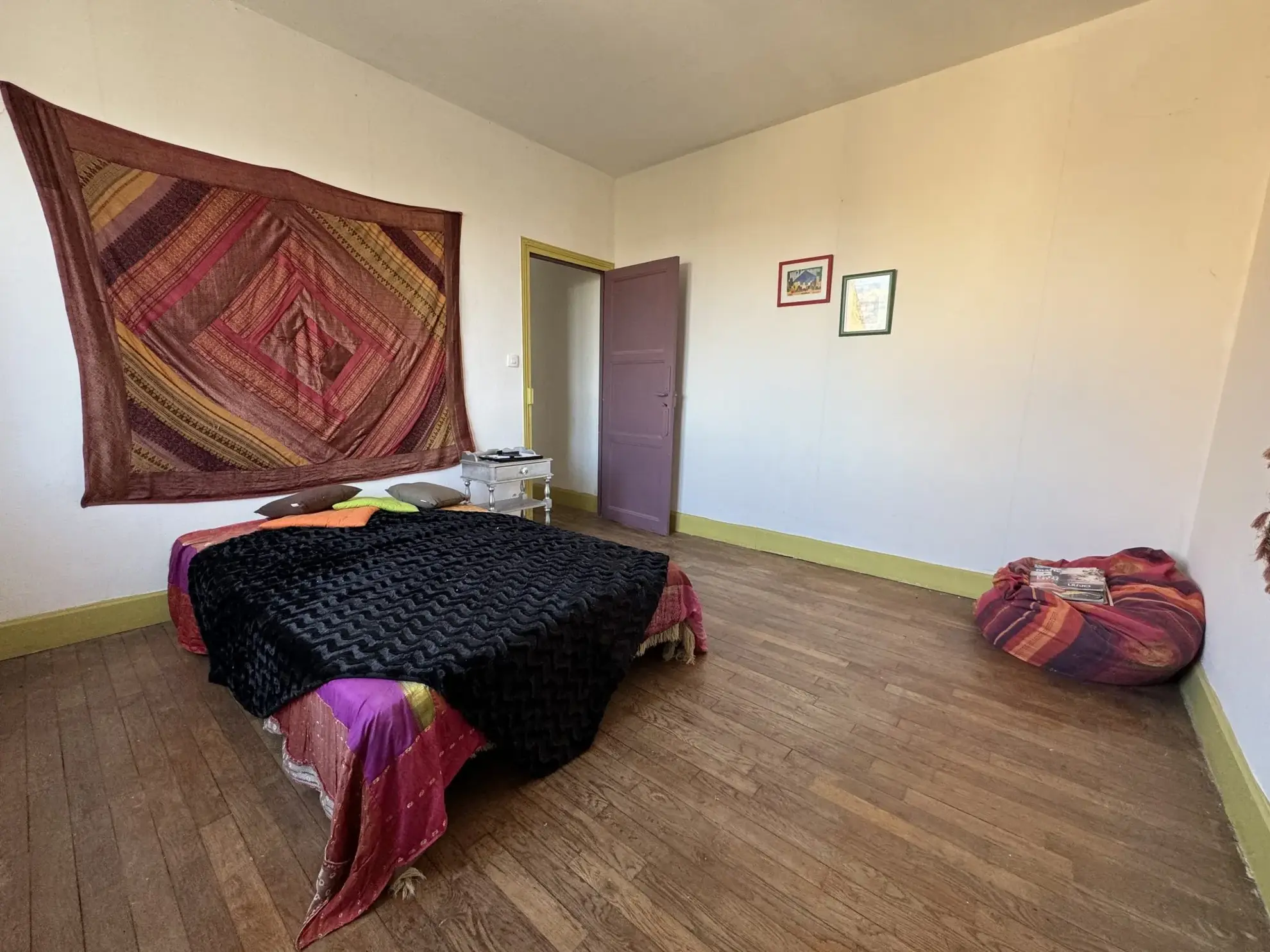Maison de ville à Montluçon avec jardin et cave - Opportunité d'investissement 