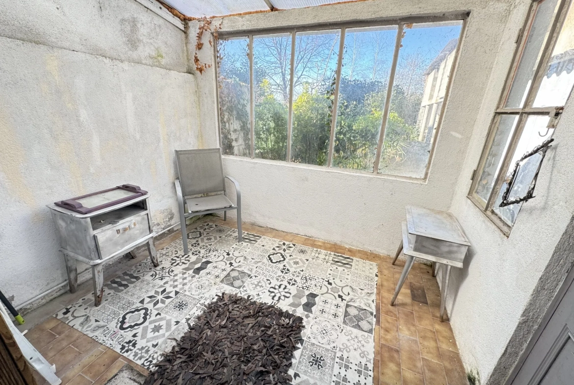 Maison de ville à Montluçon avec jardin et cave - Opportunité d'investissement 