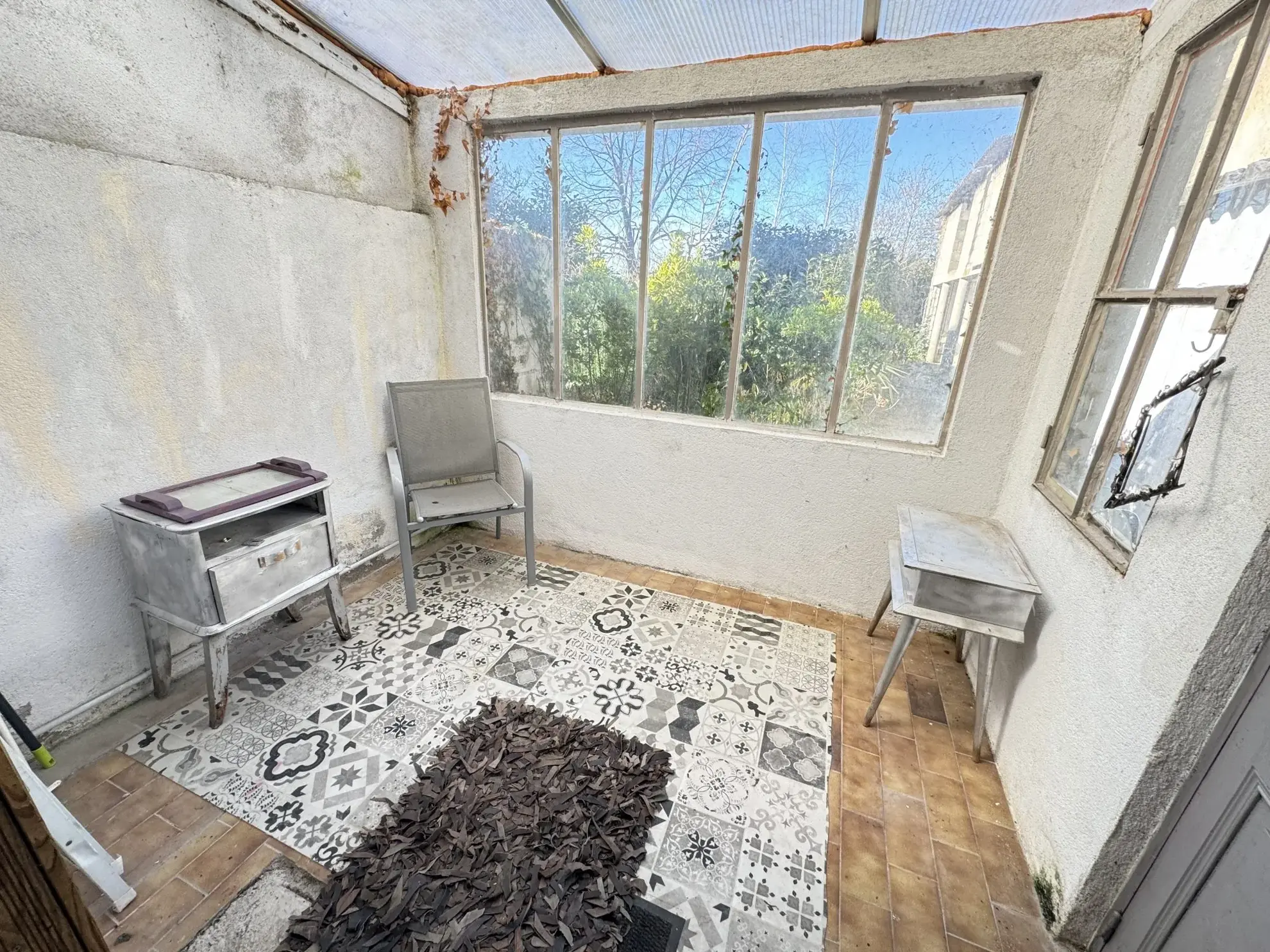 Maison de ville à Montluçon avec jardin et cave - Opportunité d'investissement 