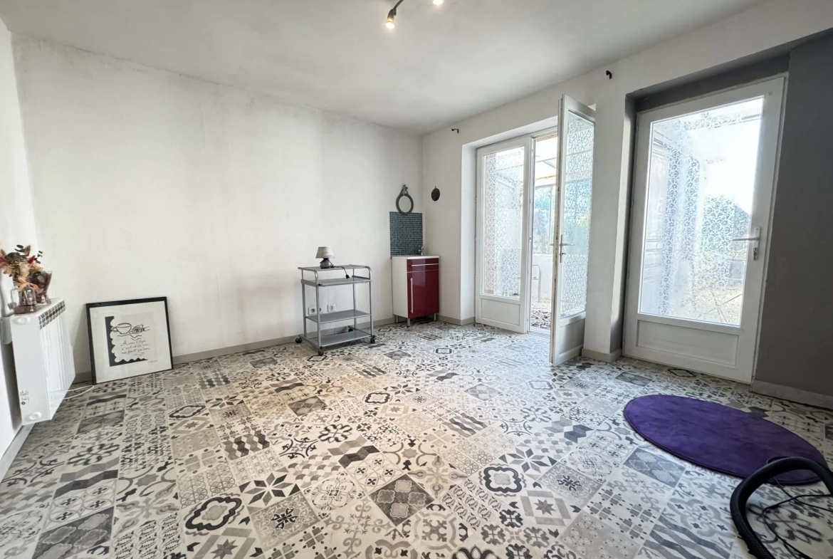 Maison de ville à Montluçon avec jardin et cave - Opportunité d'investissement 
