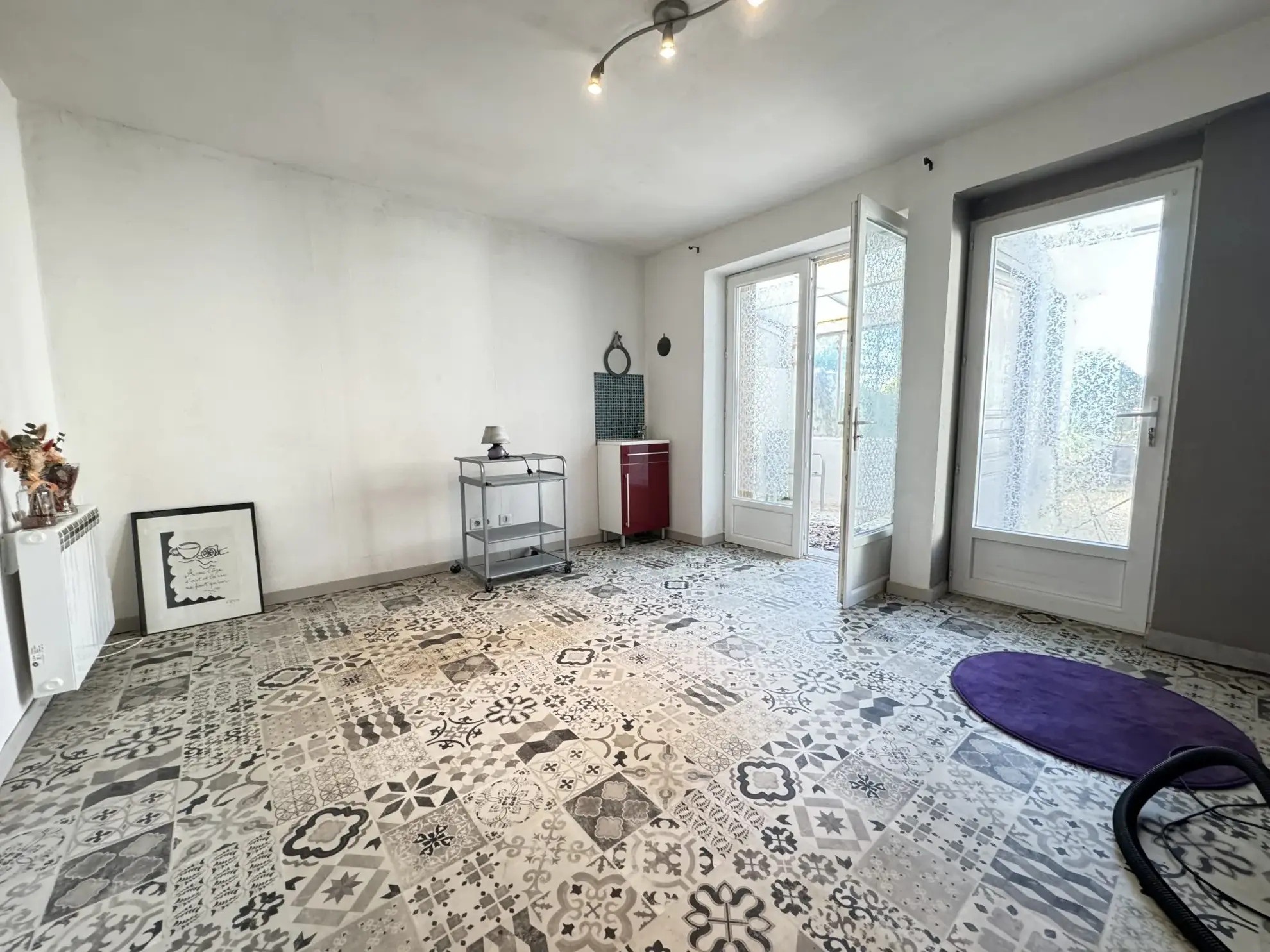 Maison de ville à Montluçon avec jardin et cave - Opportunité d'investissement 