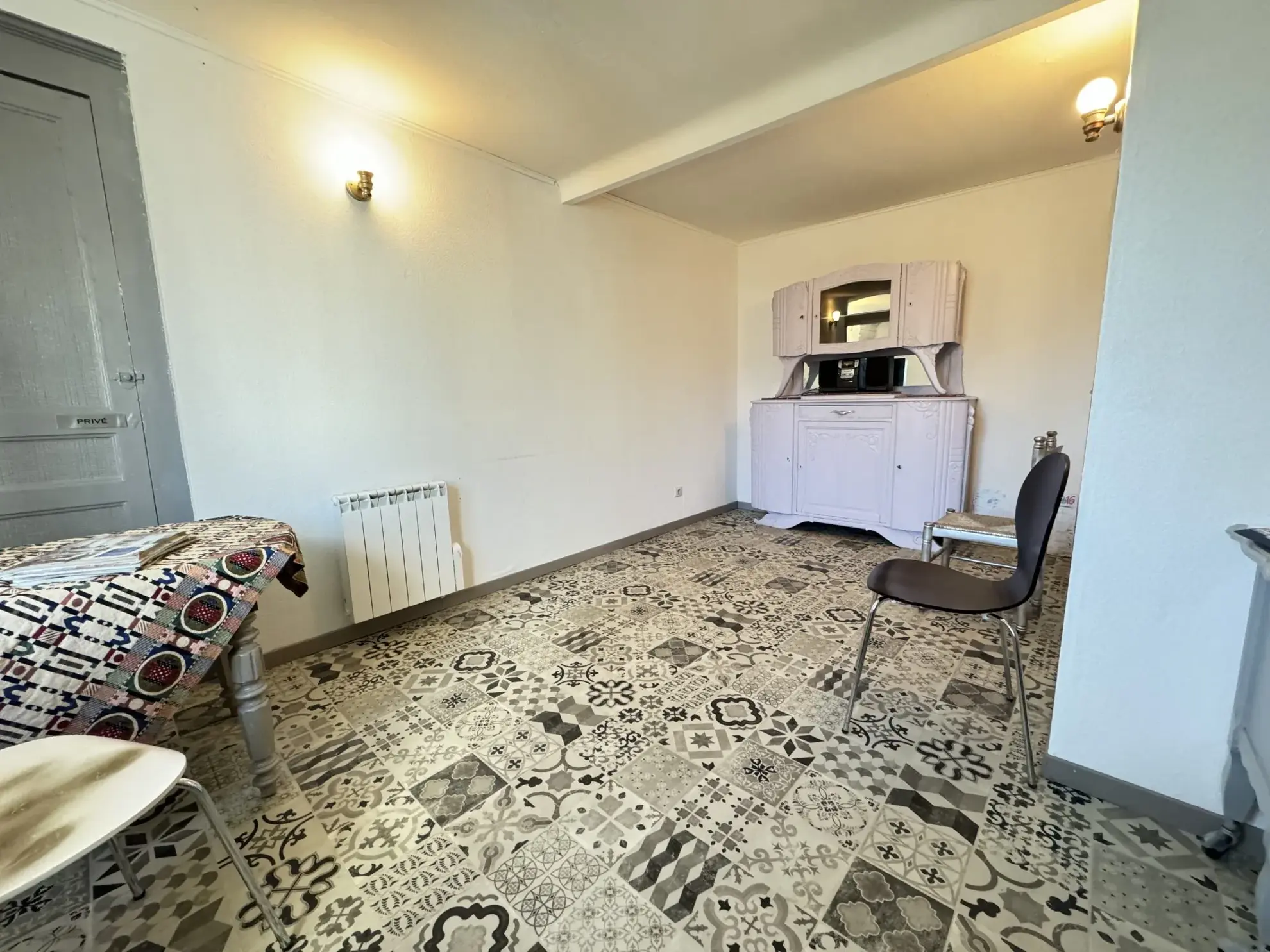 Maison de ville à Montluçon avec jardin et cave - Opportunité d'investissement 