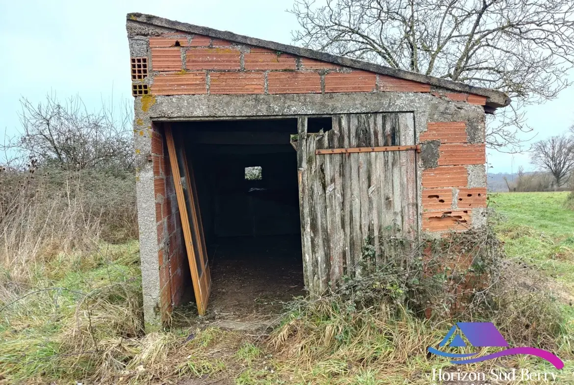 Garage sur terrain non attenant Charmante maison de campagne à La Berthenoux avec jardin et garage 