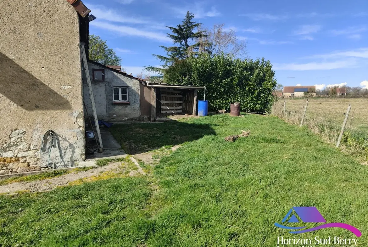 Jardin arrière Charmante maison de campagne à La Berthenoux avec jardin et garage 