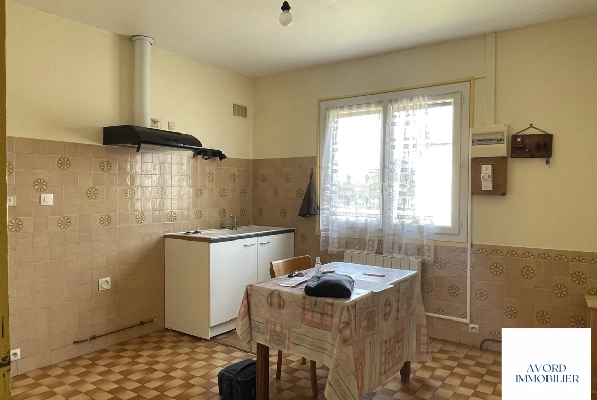 Maison à vendre à Avord de 91,16 m² avec terrain et garage 