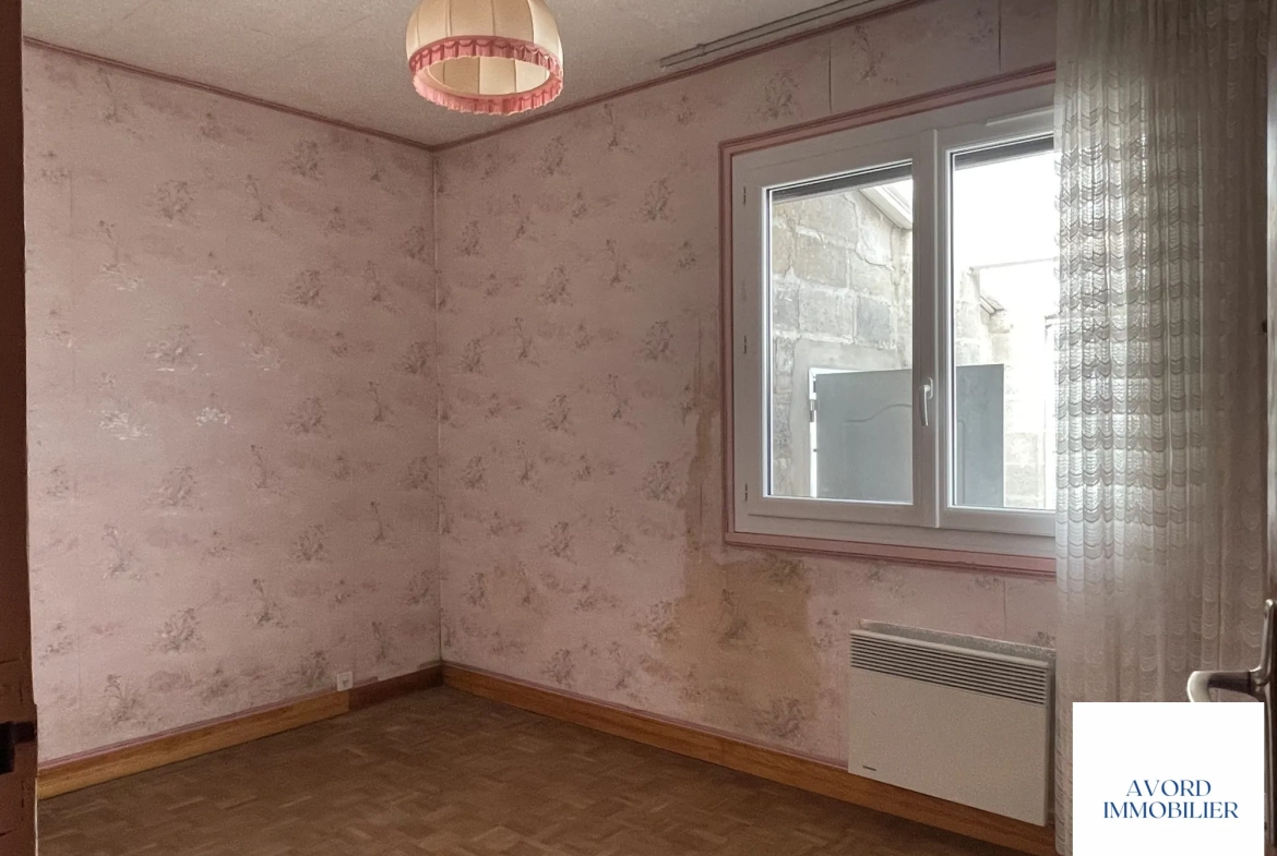 Maison à vendre à Avord de 91,16 m² avec terrain et garage 
