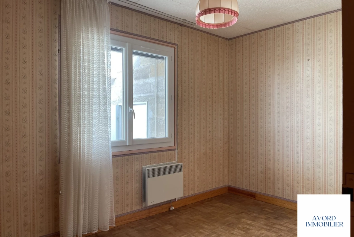 Maison à vendre à Avord de 91,16 m² avec terrain et garage 