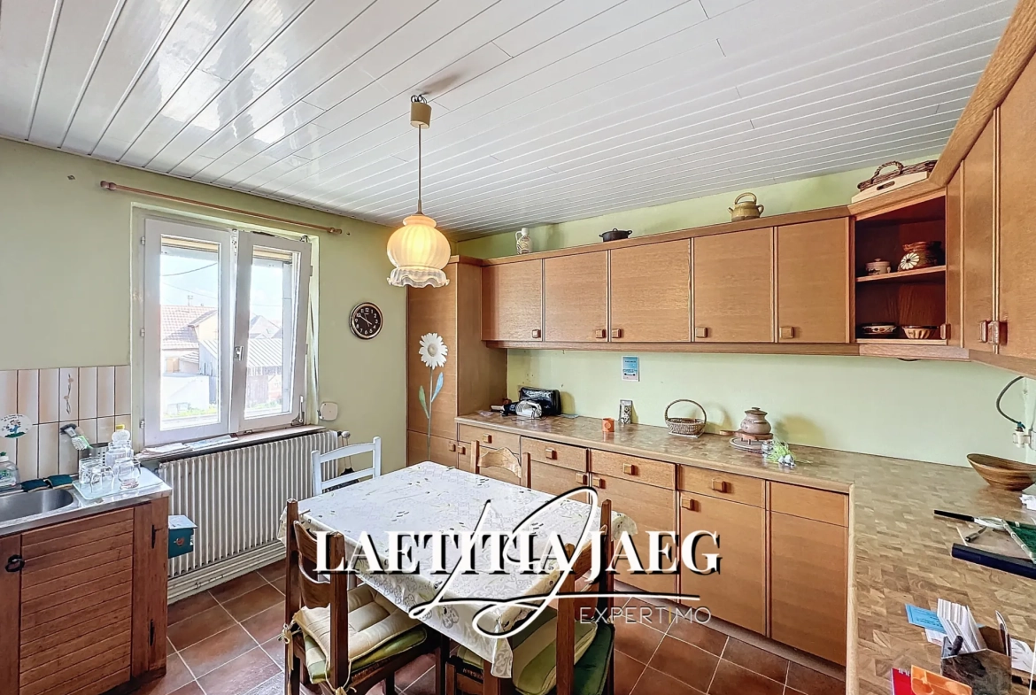 Grande maison familiale avec dépendance à Matzenheim - potentiel exceptionnel 