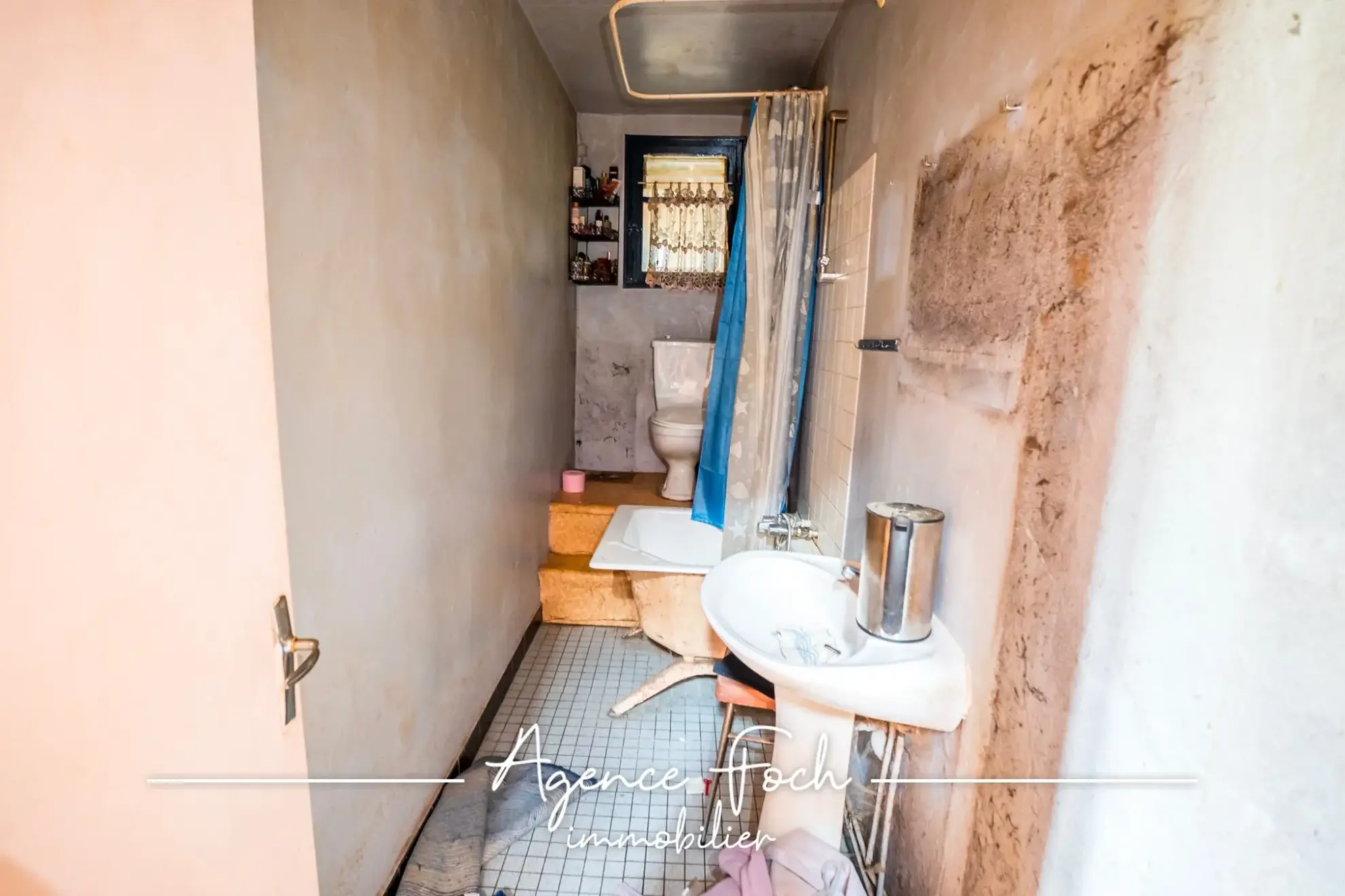 Maison de ville à rénover avec garage et jardin proche de Tarbes 