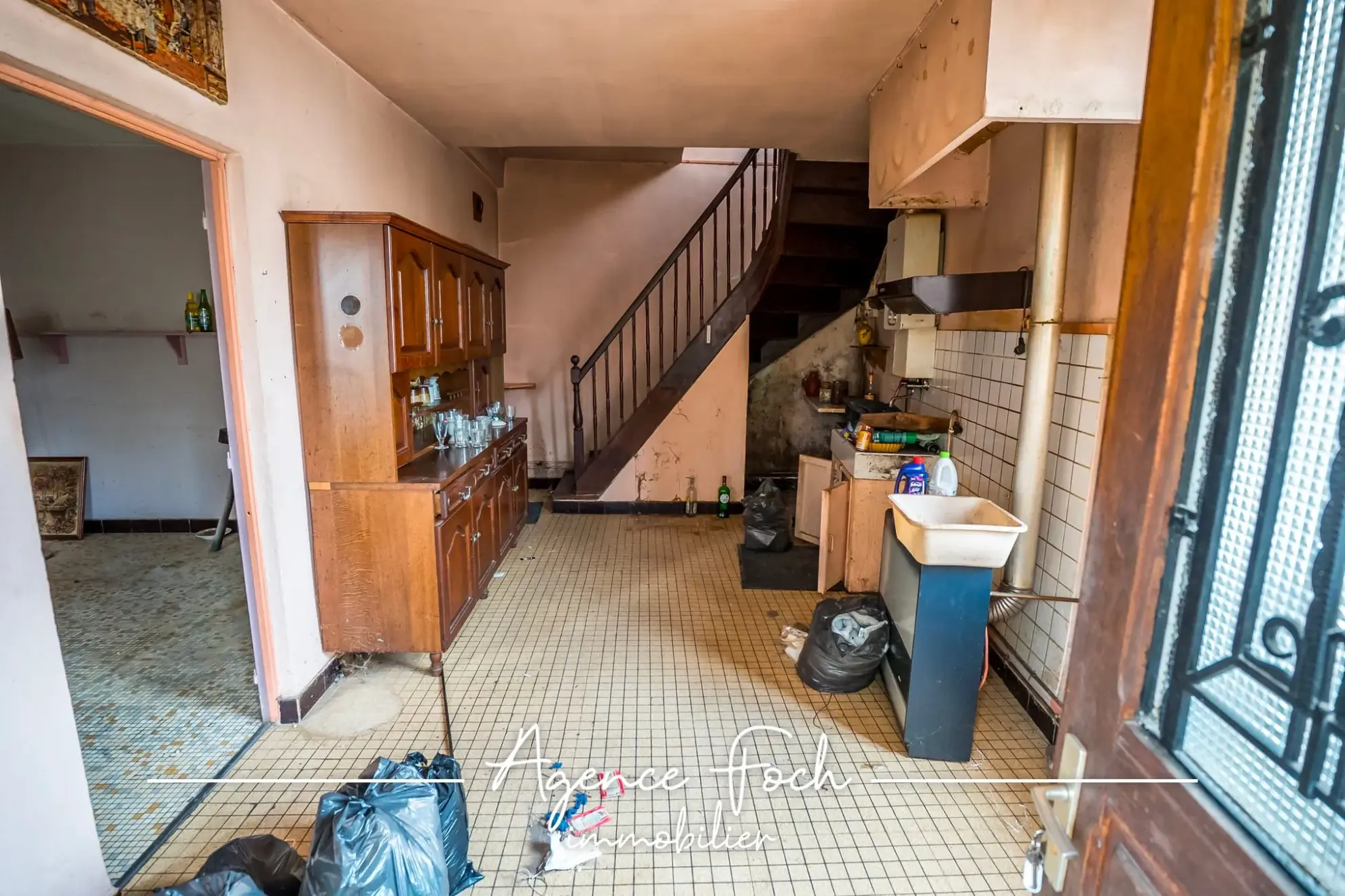 Maison de ville à rénover avec garage et jardin proche de Tarbes 