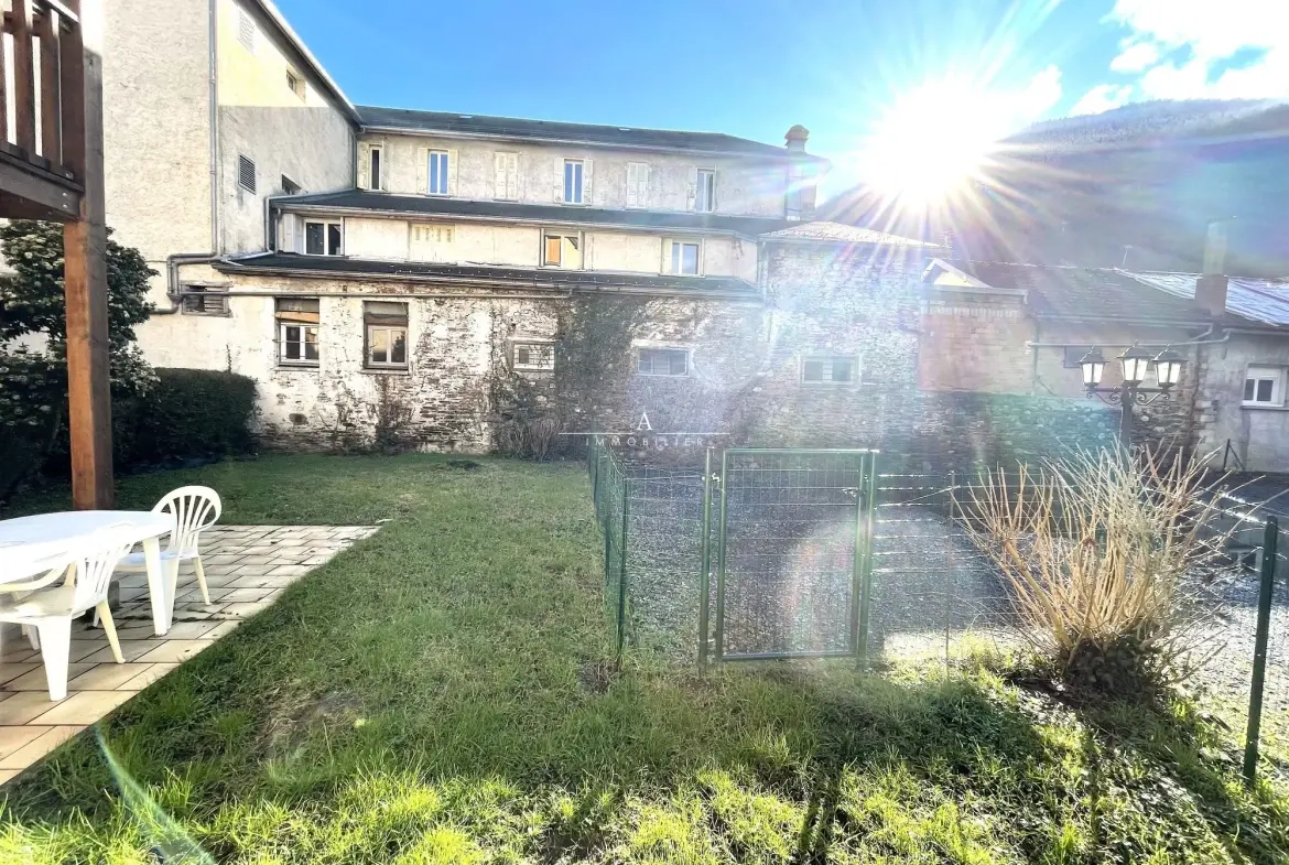 Appartement T2 rénové avec jardin à Luchon, vue dégagée, parking privé 