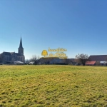 Terrain constructible à Bouhans-lès-Lure avec vue dégagée et faible aléa