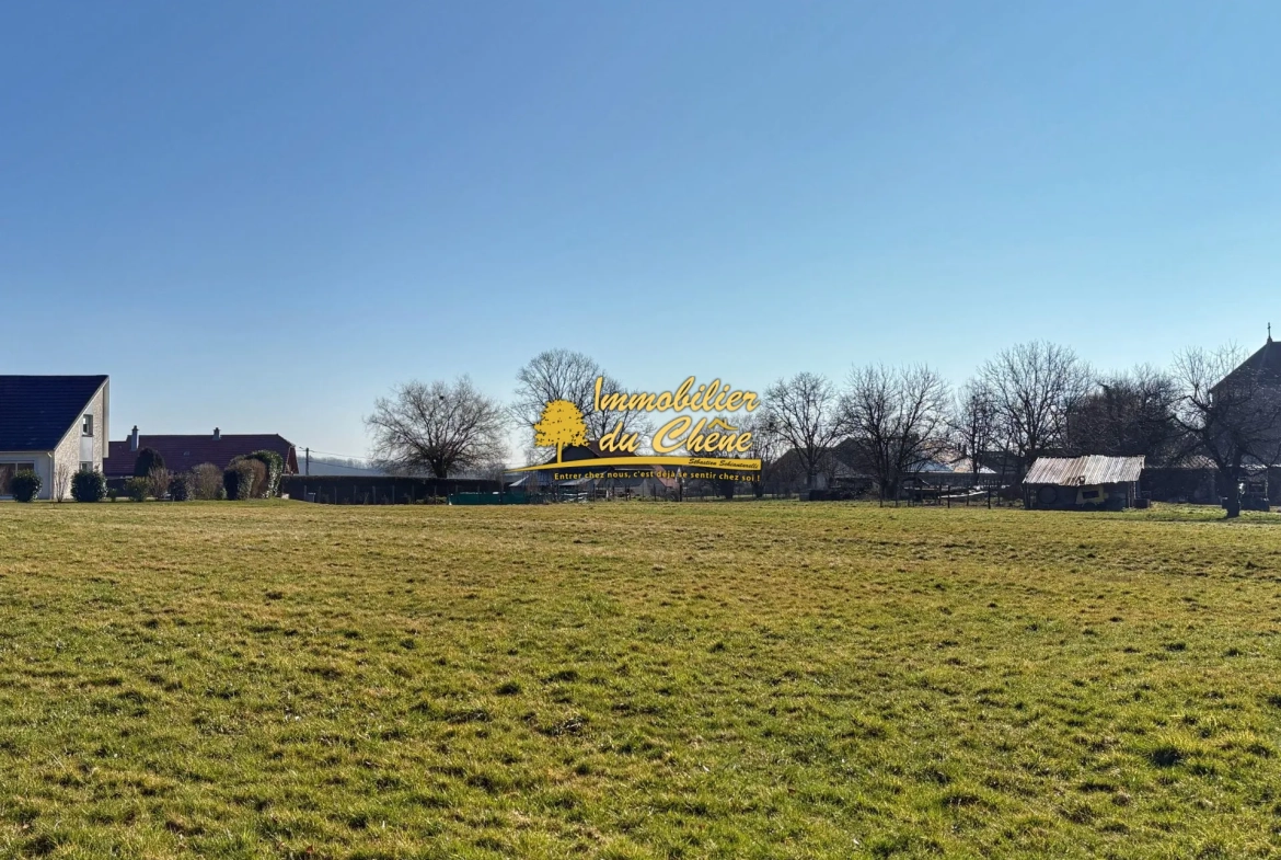 Terrain constructible à Bouhans-lès-Lure avec vue dégagée et faible aléa 