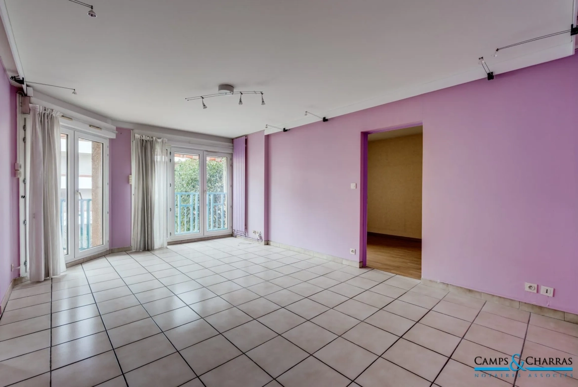 Appartement T4 à vendre à Toulouse Croix-Daurade – 75 m², 3 chambres, parking, proche commodités 