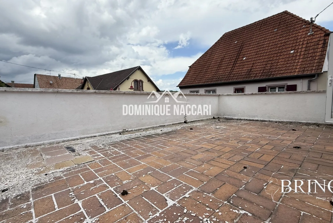 Grande maison de ville à vendre à Orschwihr avec terrasse - Projet de rénovation et potentiel d'aménagement 