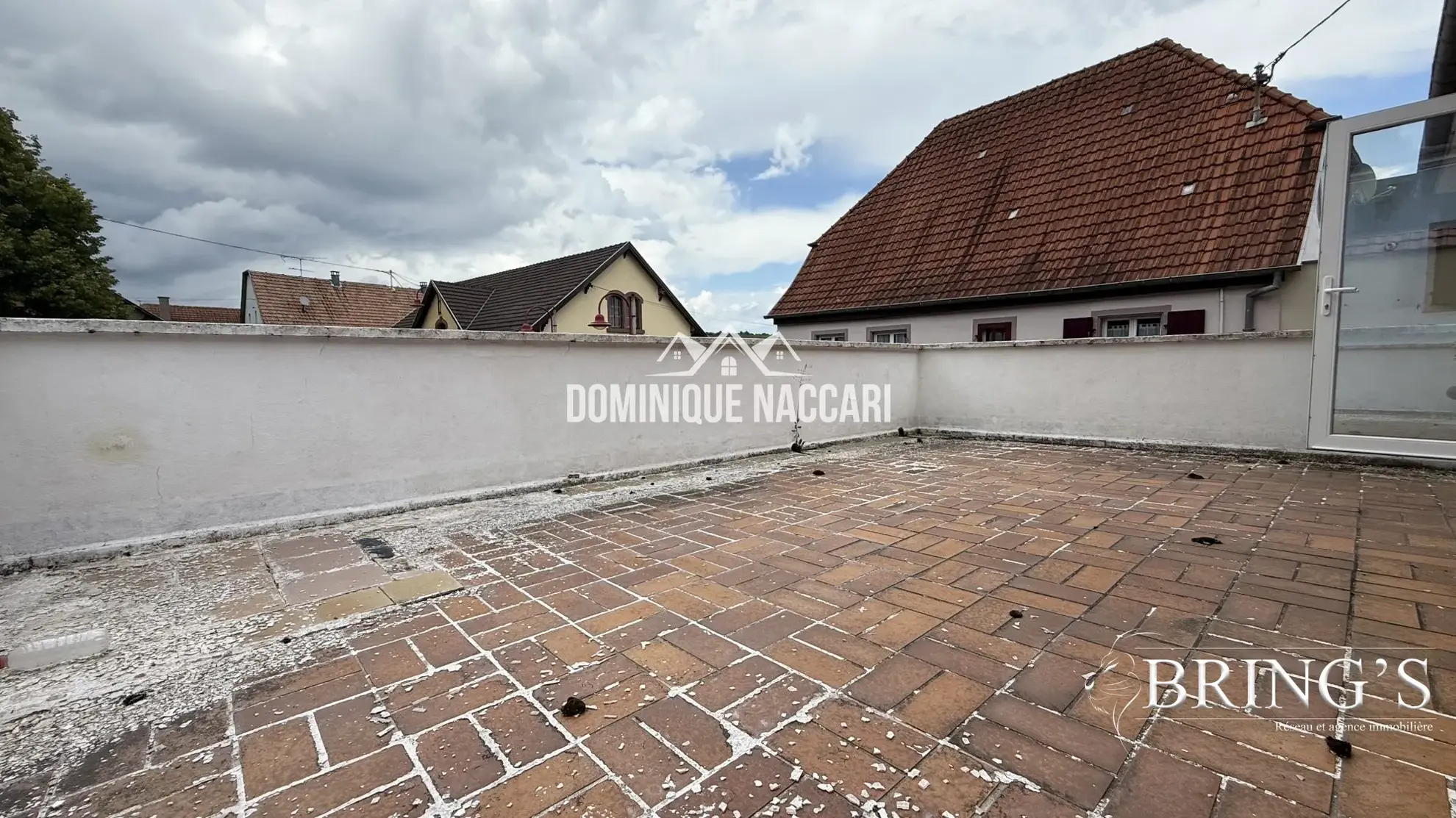 Grande maison de ville à vendre à Orschwihr avec terrasse - Projet de rénovation et potentiel d'aménagement 