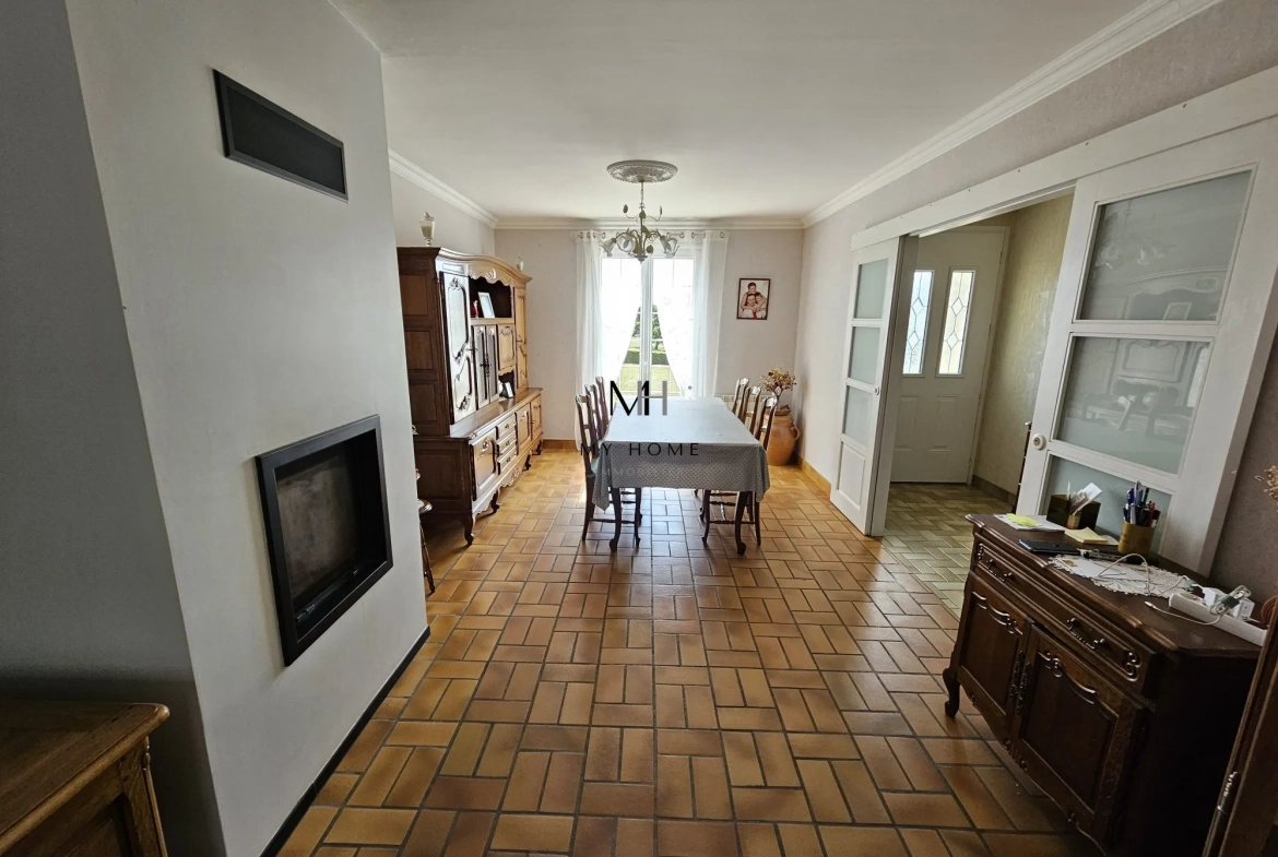 Maison spacieuse avec sous-sol et terrain arboré entre Alençon et Mamers 