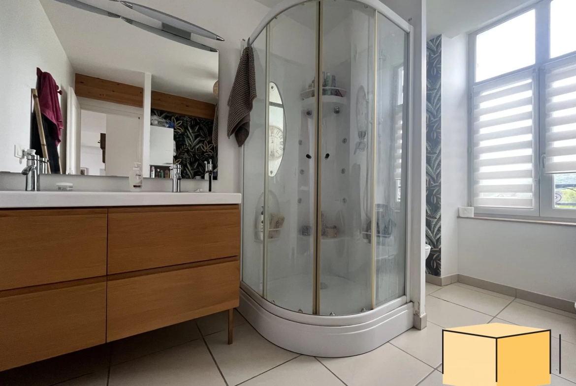 Spacieux appartement F3 rénové à Belley – 67,20 m² avec cave et charges faibles 