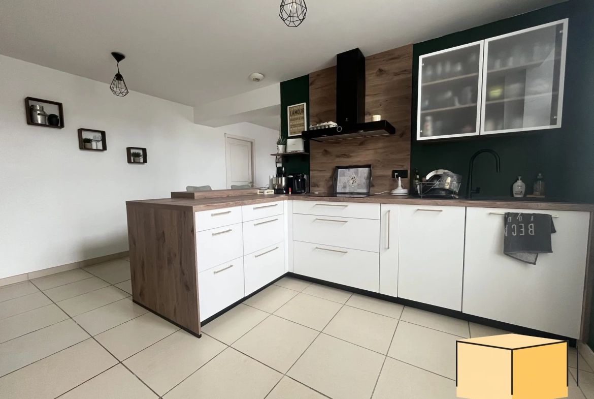Spacieux appartement F3 rénové à Belley – 67,20 m² avec cave et charges faibles 