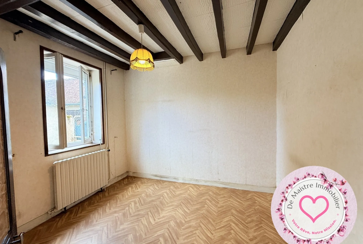 Maison de ville à Viglain avec 3 chambres et potentiel de rénovation 