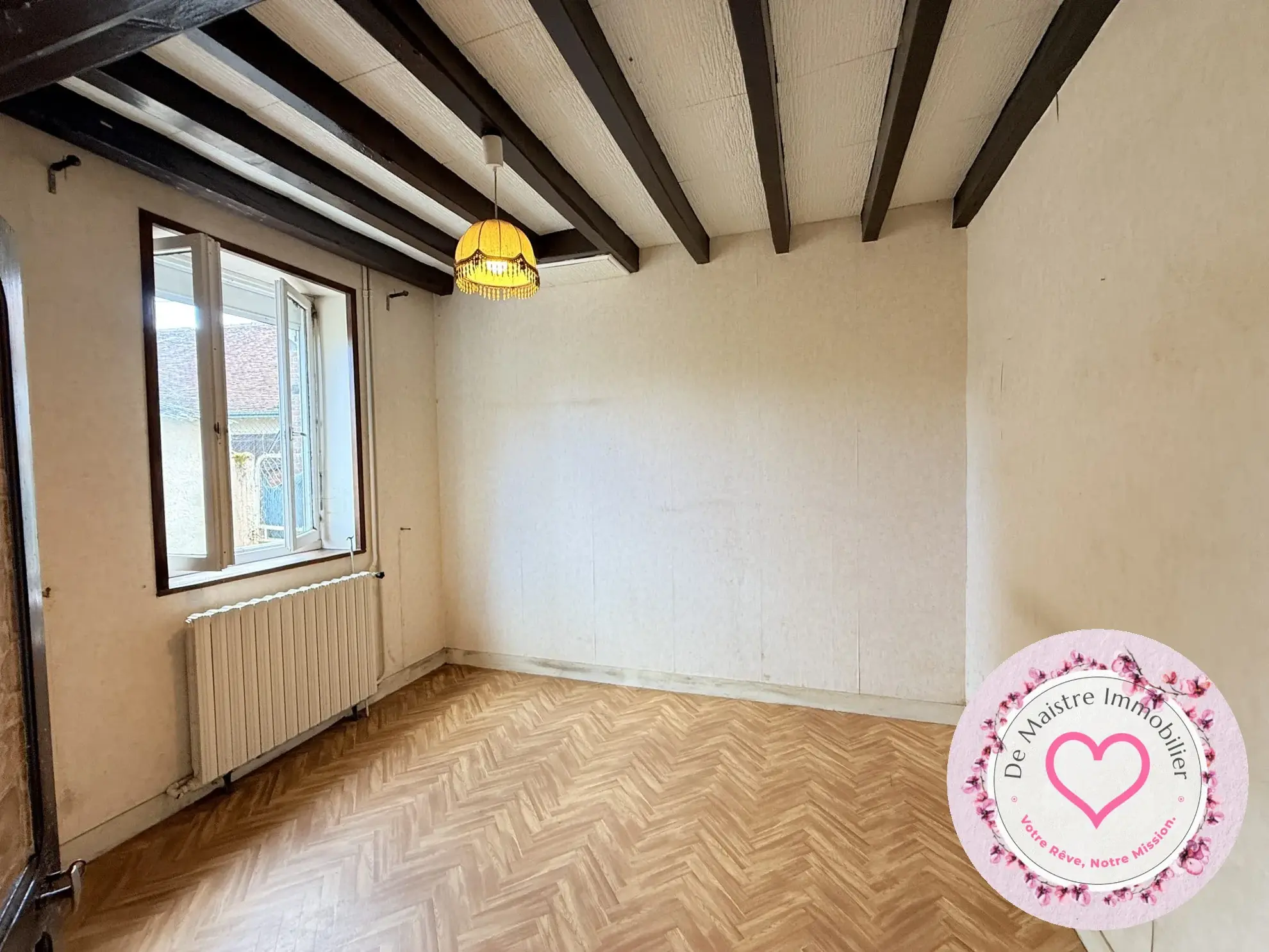 Maison de ville à Viglain avec 3 chambres et potentiel de rénovation 