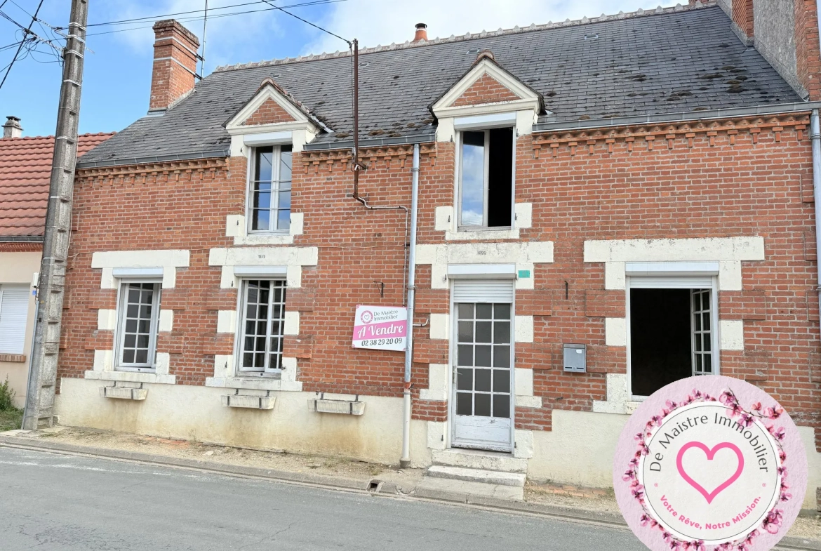 Maison de ville à Viglain avec 3 chambres et potentiel de rénovation 