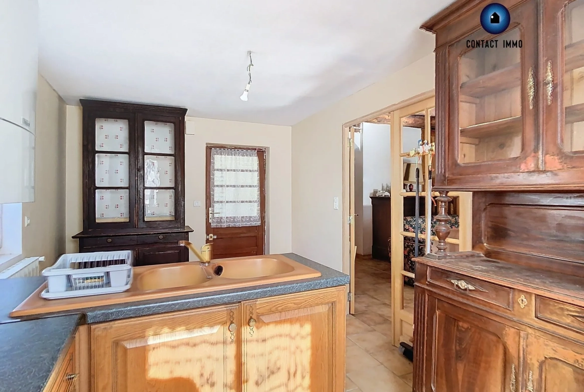 Maison à Donzenac 60 m² avec jardin et caves, idéal investissement ou premier achat 