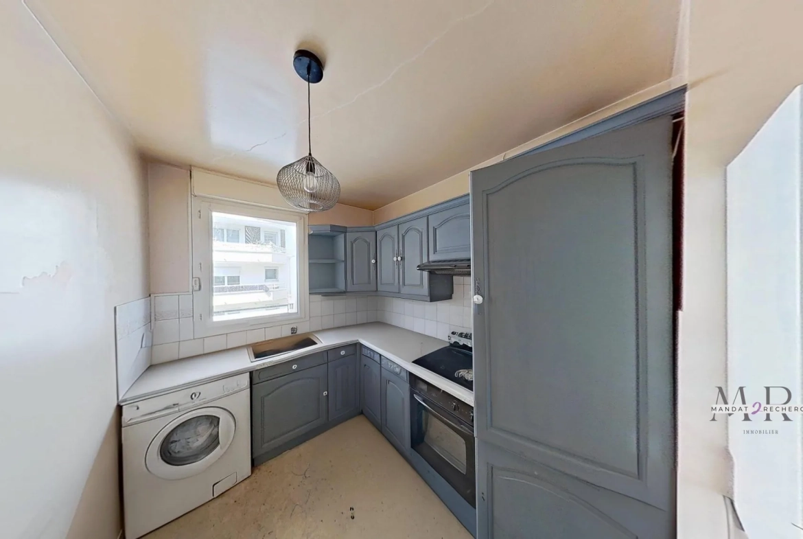 Appartement familial à rénover en hyper-centre de Noisy-le-Grand avec parking privatif 