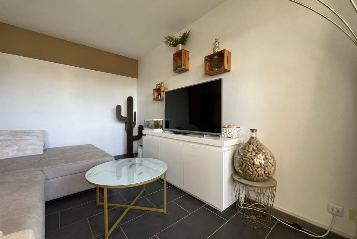 Appartement lumineux à Dijon avec terrasse, cave et résidence sécurisée 