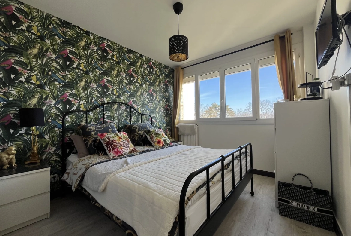 Appartement lumineux à Dijon avec terrasse, cave et résidence sécurisée 